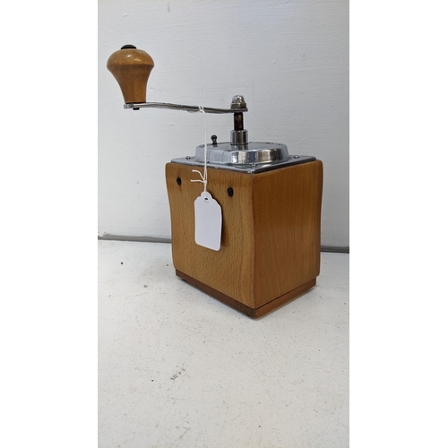 201 - A Kym Mokka vintage beech and chrome coffee grinder
Location: 10-1
If there is no condition report s... 