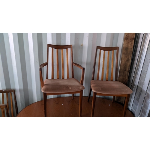 219 - A G-Plan teak extending dining table and a set of six chairs Location: BB
If there is no condition r... 