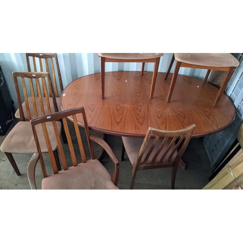 219 - A G-Plan teak extending dining table and a set of six chairs Location: BB
If there is no condition r... 