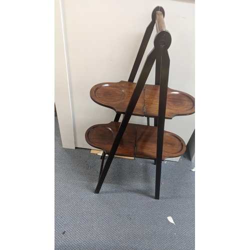 346 - A Victorian walnut stool, a mahogany folding cake stand and a surveyor's measure
Location: A3M
If th... 