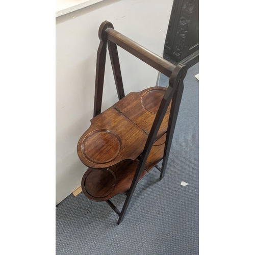 346 - A Victorian walnut stool, a mahogany folding cake stand and a surveyor's measure
Location: A3M
If th... 