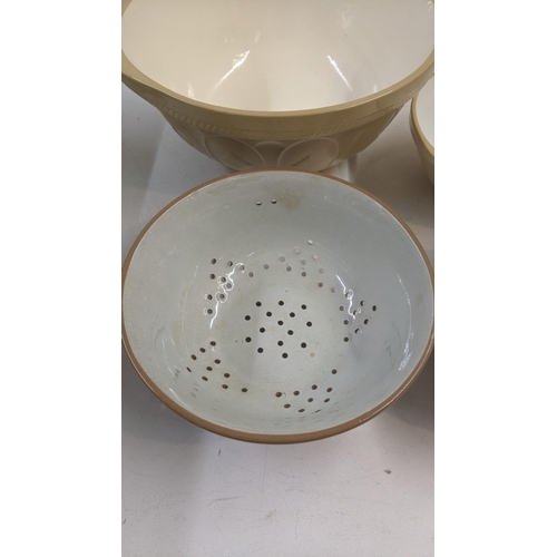 347 - Three T G Green mixing bowls and a strainer bowl
Location: 5-2
If there is no condition report shown... 