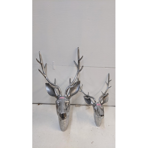 416 - Two cast metal stags heads largest 70cm h
Location: G
If there is no condition report shown, please ... 