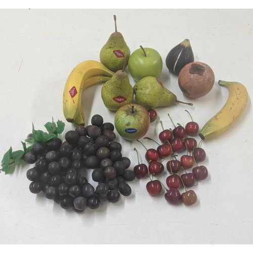 67 - A collection of Penkridge model fruit to include three pears, bananas and an apple together with oth... 