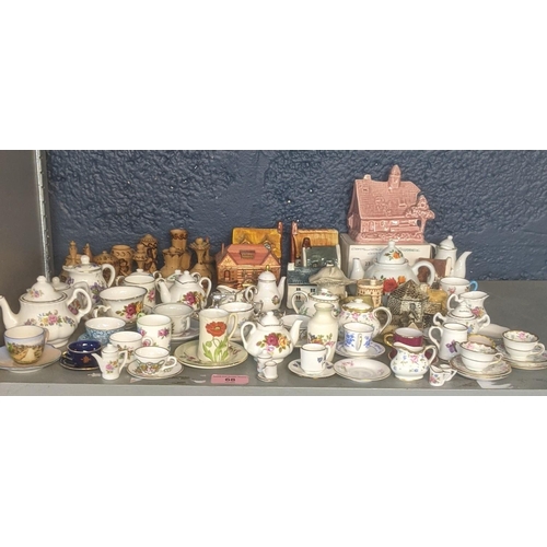 68 - Mixed ceramics to include a quantity of miniature teapots, cups and saucers and others to include Ro... 