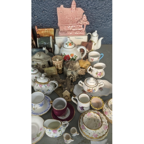 68 - Mixed ceramics to include a quantity of miniature teapots, cups and saucers and others to include Ro... 