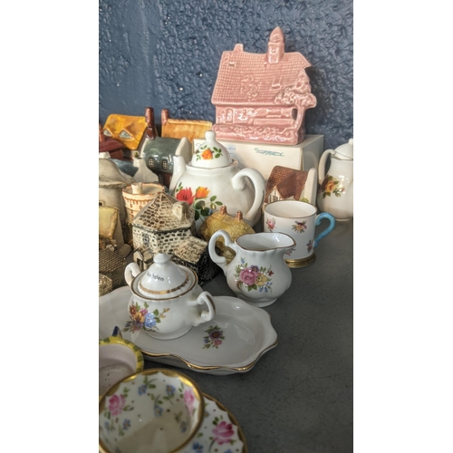 68 - Mixed ceramics to include a quantity of miniature teapots, cups and saucers and others to include Ro... 