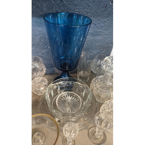 70 - Mixed glassware to include an early 20th century sapphire blue pedestal bowl, early 20th century gil... 