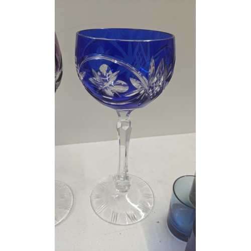 75 - Three vintage crystal cut tall stem wine glasses to include cobalt blue example and two others, toge... 