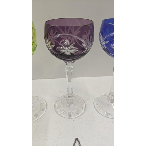 75 - Three vintage crystal cut tall stem wine glasses to include cobalt blue example and two others, toge... 