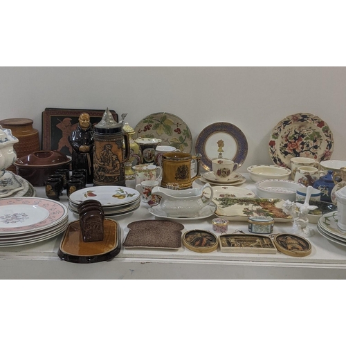 78 - A large quantity of mixed ceramics to include commemorative examples, two steins, Royal Doulton, Mas... 