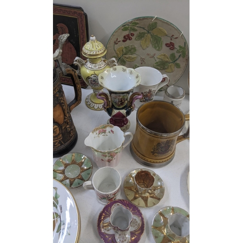 78 - A large quantity of mixed ceramics to include commemorative examples, two steins, Royal Doulton, Mas... 