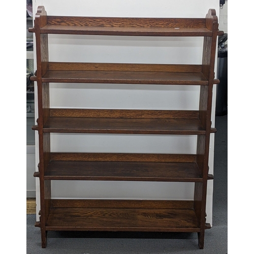 122 - An Arts & Crafts oak peg jointed five tier open bookcase, 123cm h x 90cm w
Location:A1F
If there is ... 