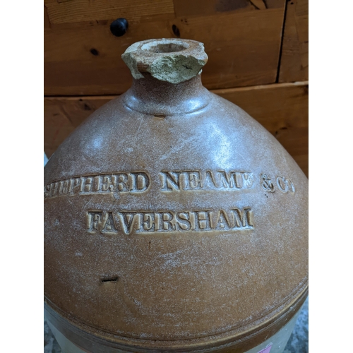 132 - Two stoneware brewery flagon jars and a pottery vase, the flagons advertising J S Smith & Co Phoenix... 