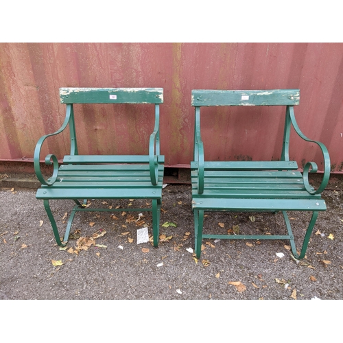 141 - Two vintage green painted wrought iron slatted garden chairs Location:G
If there is no condition rep... 