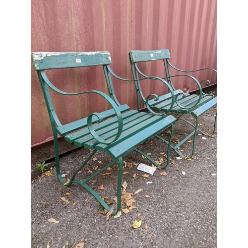 141 - Two vintage green painted wrought iron slatted garden chairs Location:G
If there is no condition rep... 