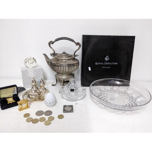 142 - A miscellaneous lot to include a silver plated tea kettle on stand, Royal Doulton glassware to inclu... 