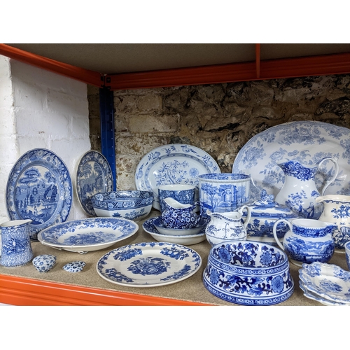 149 - A collection of 19th and later blue and white ceramics to include Spode blue room collection jugs, V... 