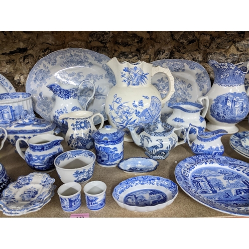 149 - A collection of 19th and later blue and white ceramics to include Spode blue room collection jugs, V... 