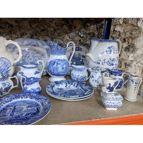 149 - A collection of 19th and later blue and white ceramics to include Spode blue room collection jugs, V... 