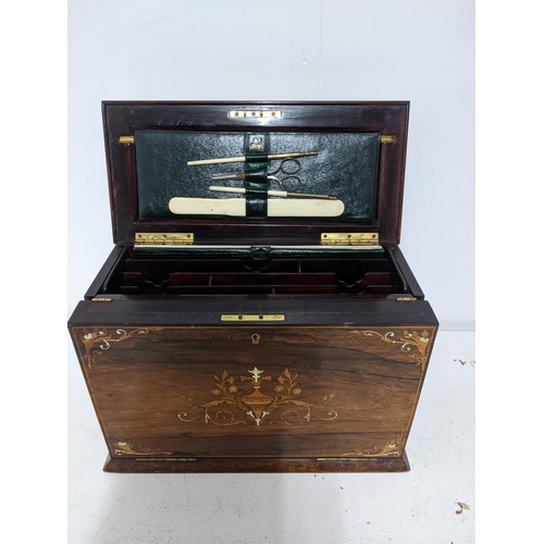 161 - A late Victorian inlaid rosewood stationery/writing box, the exterior with floral decoration and gil... 