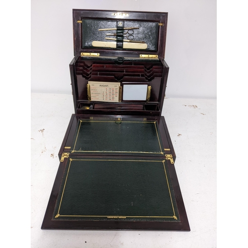 161 - A late Victorian inlaid rosewood stationery/writing box, the exterior with floral decoration and gil... 