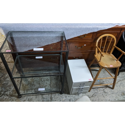 162 - A mixed lot of small furniture to include a wrought iron and glass three-tiered shelf unit, a small ... 