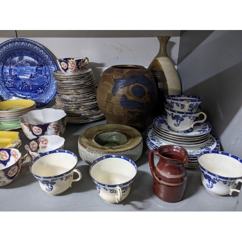 169 - A mixed lot of Victorian and later part tea sets, studio pottery to include an Isle of Wight jug, Ro... 