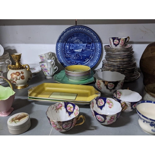 169 - A mixed lot of Victorian and later part tea sets, studio pottery to include an Isle of Wight jug, Ro... 