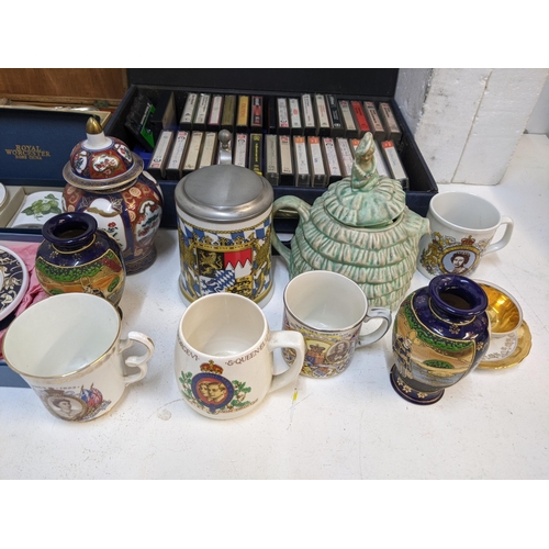 2 - A mixed lot of ceramics and china to include hanging decorative plates, a sacred art figure, some Or... 