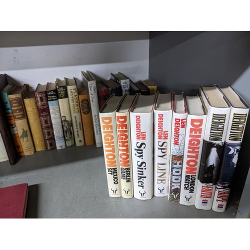 250 - A quantity of books to include eight Len Deighton books, some 1st edition, Sherlock Holmes, John Buc... 