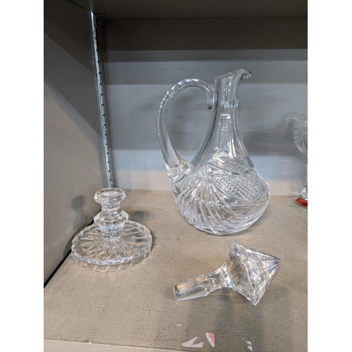 264 - Crystal (Cristal 24% PBO Souffle bouche taille main) comprising a large jug with stand and stopper, ... 