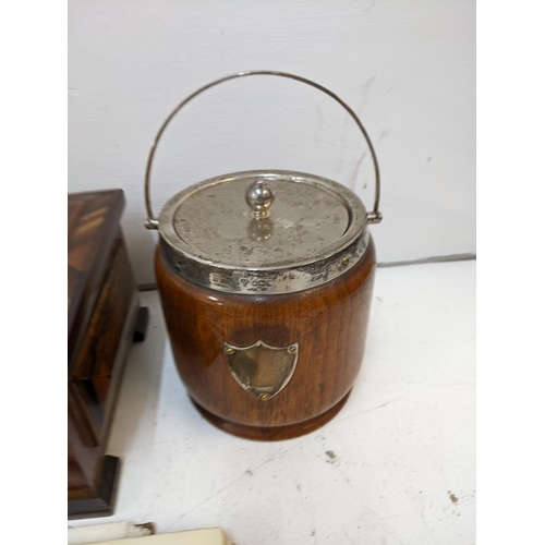 281 - A hallmarked silver topped barrel with oak frame and ceramic insert, a pewter pint jug, a hallmarked... 