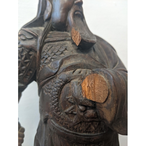 293 - Two wooden figures of Chinese gentleman standing proudly and a liaison cup
Location: A2F
If there is... 