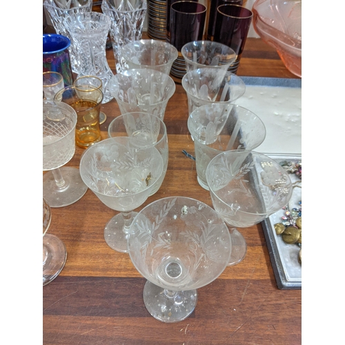 3 - Glassware to include a pair of mottled orange glass vases, a Bohemian crystal bowl, Babycham glasses... 