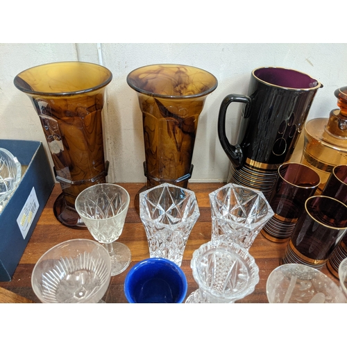 3 - Glassware to include a pair of mottled orange glass vases, a Bohemian crystal bowl, Babycham glasses... 