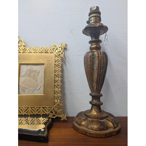 319 - Mixed items to include three candlesticks, a gold coloured ornate and pierced double photo frame and... 