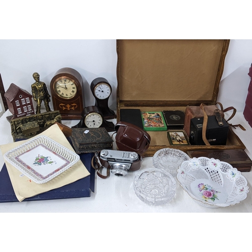 327 - A mixed lot to include vintage playing cards, Kodak Retinette camera, mantel clocks and other items
... 