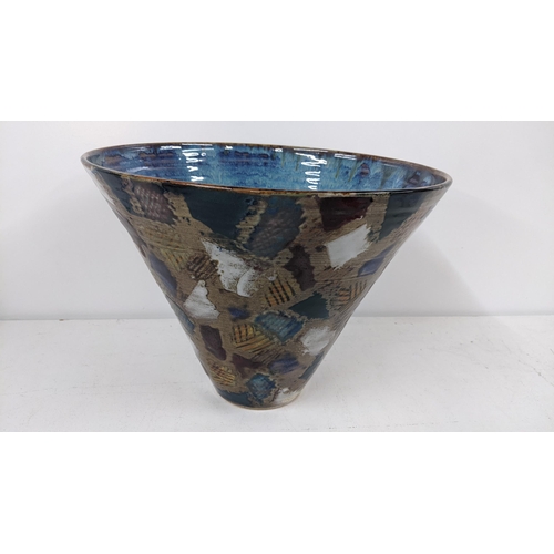 342 - A Studio pottery cone shaped base with various patterns, signed to the base, 24cm h x 31.5cm w
Locat... 