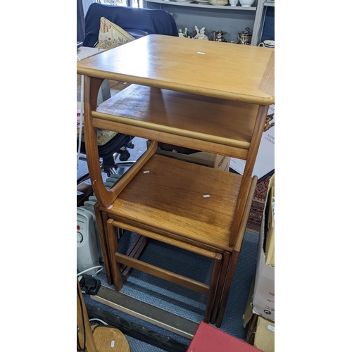 356 - ***THIS LOT HAS BEEN WITHDRAWN**
Two mid 20th century teak standard lamps together with a two tier s... 