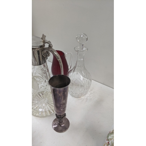 364 - Glassware to include a clear cut and silver plated claret jug, together with similar Royal Brierly c... 