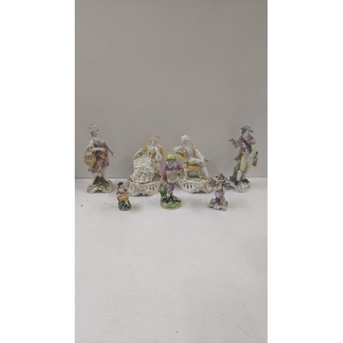 365 - 19th century and later porcelain figures to include a Derby figure of a boy A/F, together with a sce... 