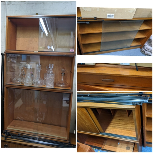 368 - THIS LOT IS WITHDRAWN
An Avalon retro teak Ladderax style unit consisting of six cabinets, twelve ro... 