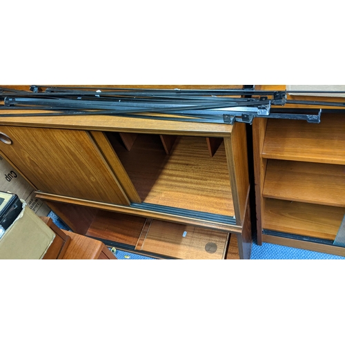 368 - THIS LOT IS WITHDRAWN
An Avalon retro teak Ladderax style unit consisting of six cabinets, twelve ro... 