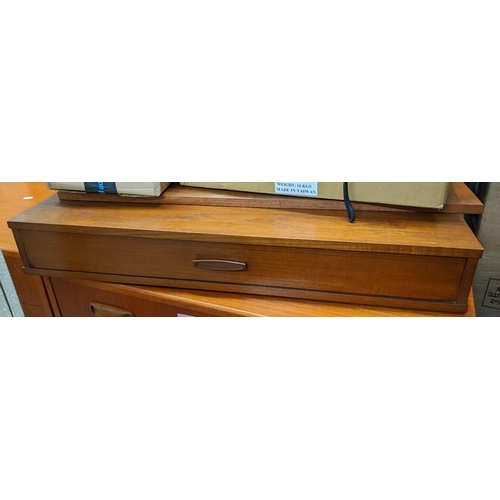 368 - THIS LOT IS WITHDRAWN
An Avalon retro teak Ladderax style unit consisting of six cabinets, twelve ro... 