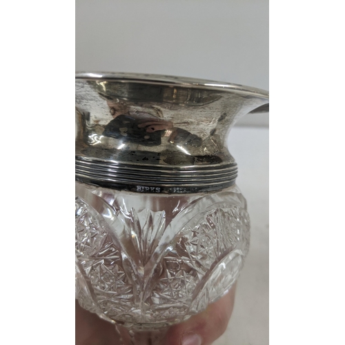 370 - A Birks sterling silver and crystal cut glass pedestal vase together with a silver rimmed jar
Locati... 