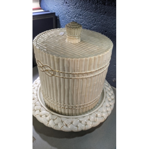 379 - A Victorian cream ware 'Bamboo' pattern cheese dome on a later base, 30cm, h
Location: 3-1
If there ... 