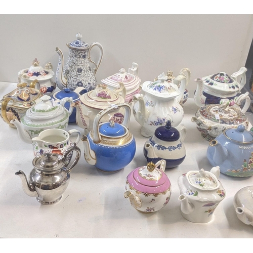 384 - A collection of Victorian and later teapots to include a blue white and gold bates and Walker & Co e... 