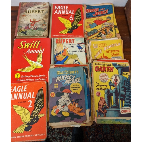 415 - A collection of annuals and magazines to include Eagle annuals '2' and '6', Mickey Mouse and the Uni... 