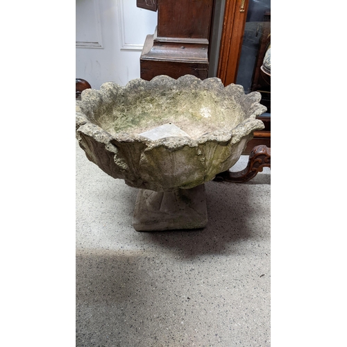 417 - Composition cast stone garden planter with an Italian style base and another
Location: G
If there is... 